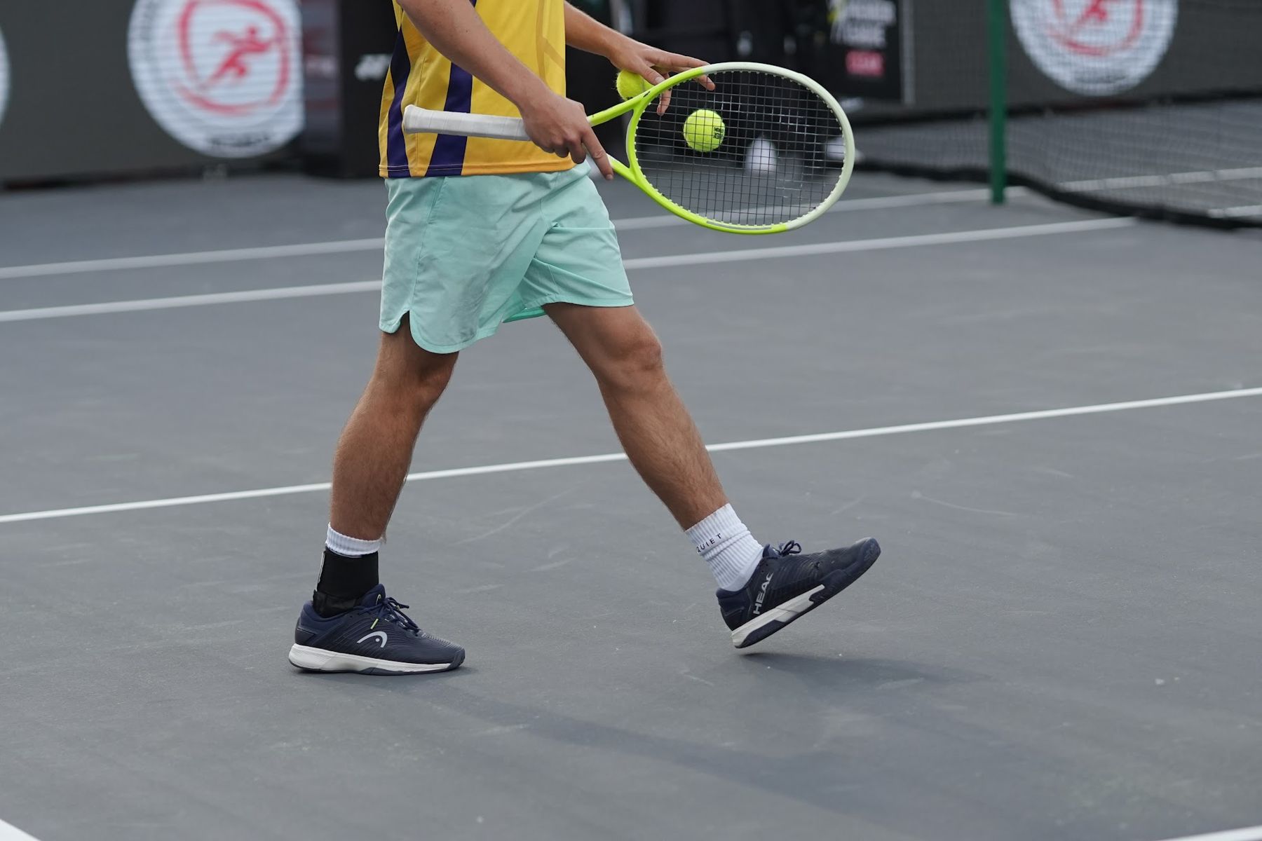 Close-up of a tennis racket and ball at a Tennis Premier League match (previous season)
