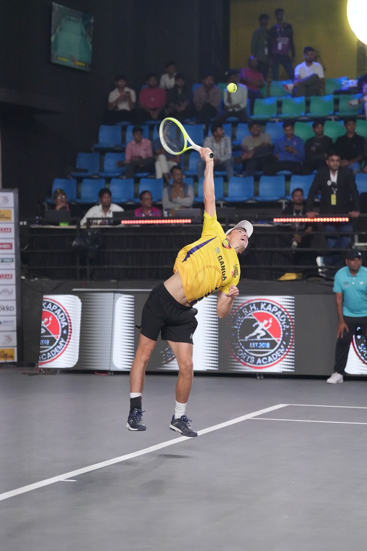 Dalibor Svrcina serving at a Tennis Premier League match (previous-season photo)