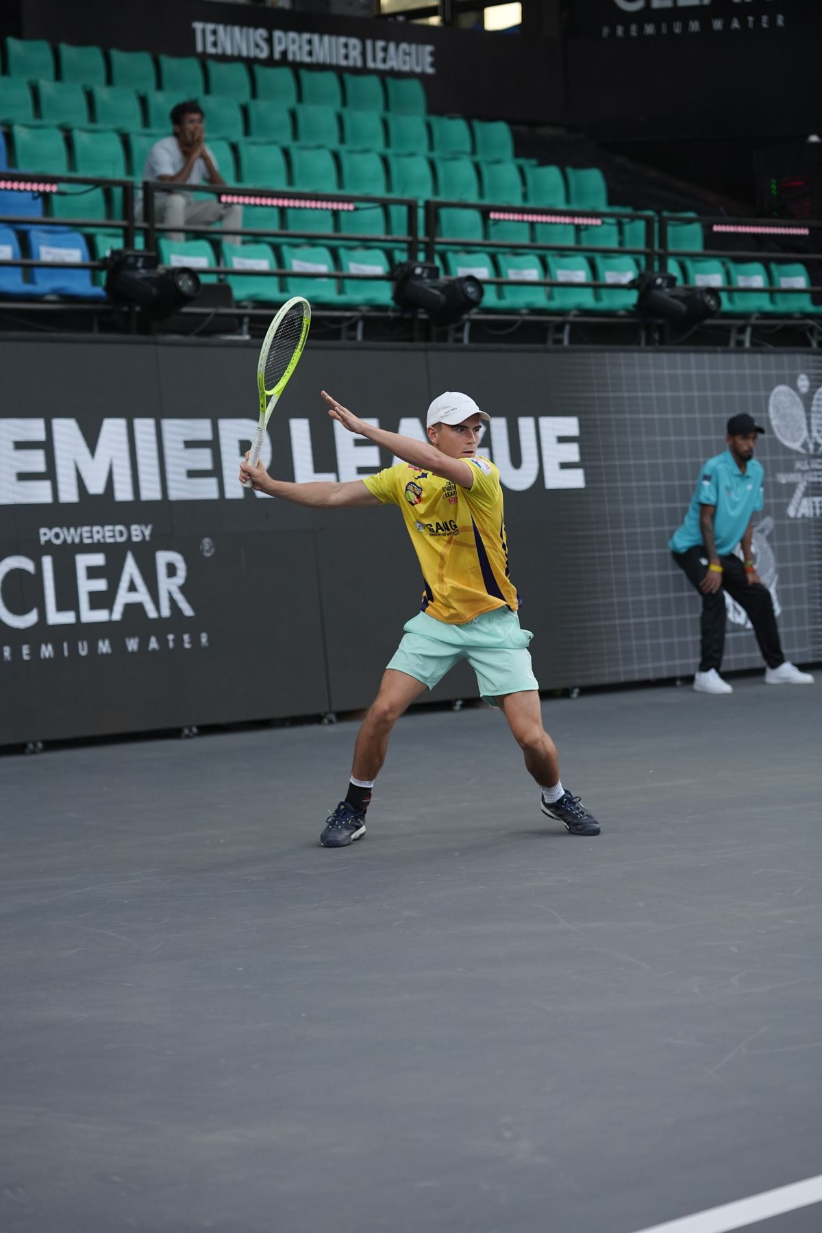 Tennis Premier League player stretching for a wide ball (previous season)